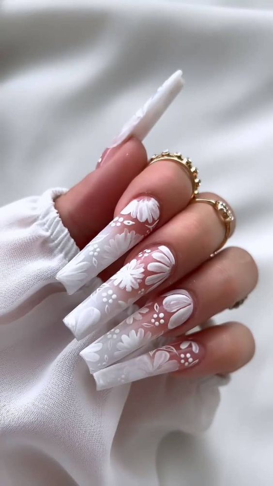 Discover 30 glamorous white nail designs that will make you the center of attention.