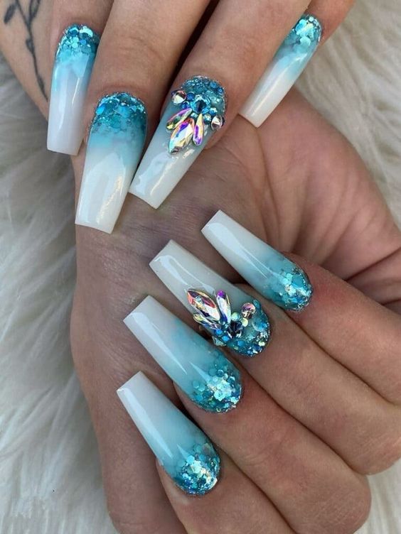 Fascinating Cyan Nail Seems to be that Gracefully Hypnotize Female Magnificence at First Look