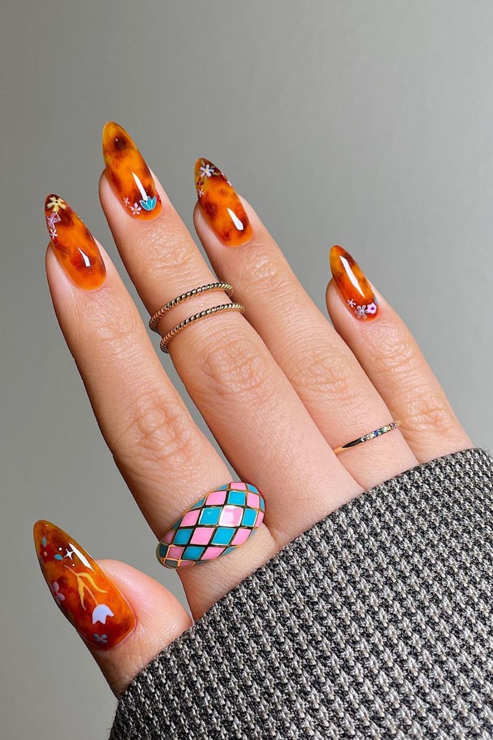 Amber tortoise nails with floral accents